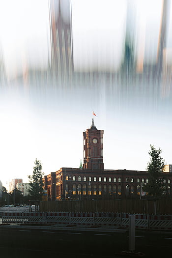 Rotes Rathaus, Berlin, clock tower, multi-exposure technique, golden hour, blurry photo, cityscape, architecture, urban scene, sunset, landmark