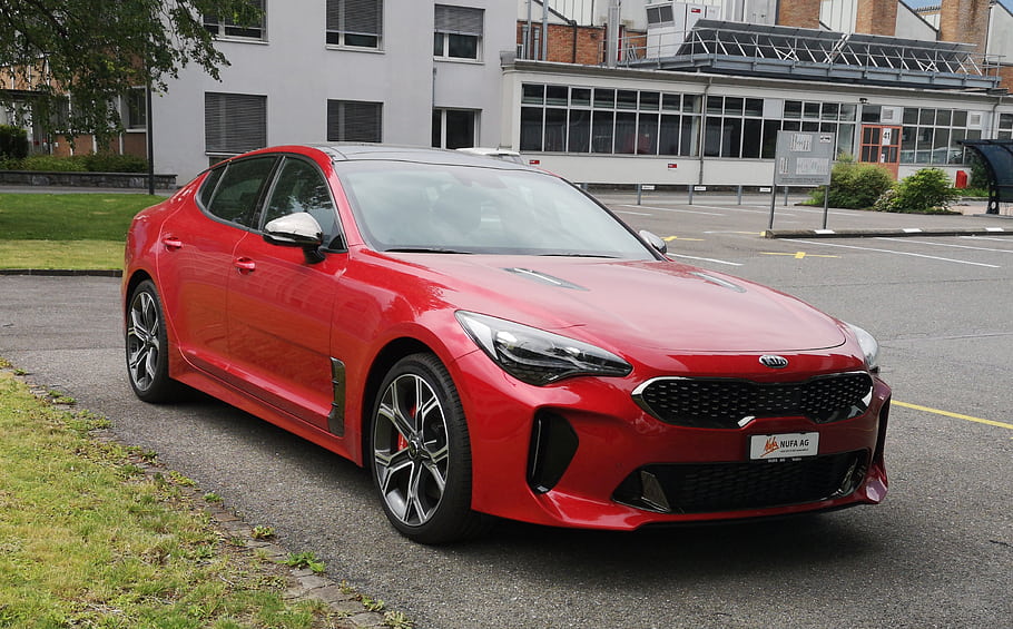 Kia, Stinger, red car, sports car, Vaduz, luxury car, sedan, front view, parked car, urban setting, modern car