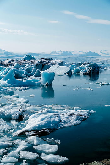 Blue ice, melting ice, Jökulsárlón Lake, Iceland, icebergs, clear blue waters, Jökulsárlón Lagoon, peaceful scene, glacial ice, natural landscape, arctic environment