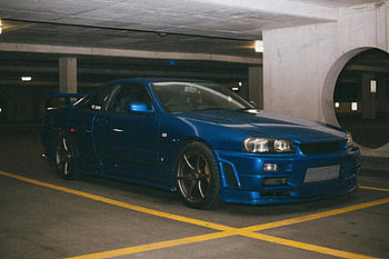 الأزرق نيسان أفق GT-R،  متوقفة،  ساحة لانتظار السيارات،  مرآب داخلي في المناطق الحضرية،  لافتة للنظر الأزرق،  سيارة،  مركبة،  كراج،  وقوف السيارات الداخلي،  سيارة رياضية،  GT-R