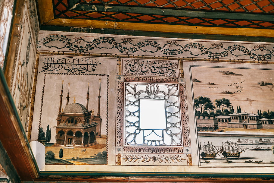 medieval palace, ornamental walls, Ottoman artwork, historical walls, Göreme National Park, Turkey, intricate designs, medieval architecture, cultural heritage, historical site, decorative patterns