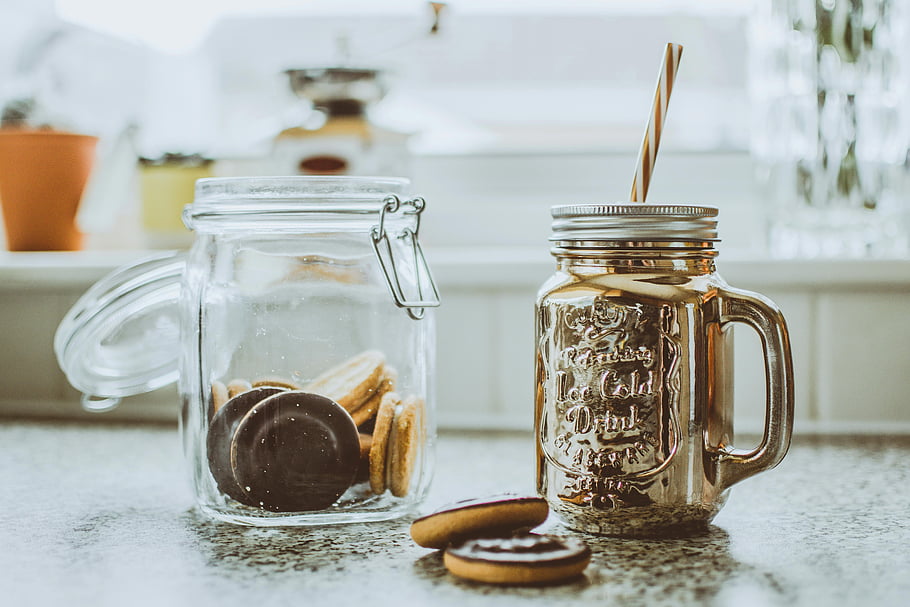 mason jars, cookies, milkshake, sunny kitchen, countertop, clear glass, black surface, straw, snack, dessert, breakfast