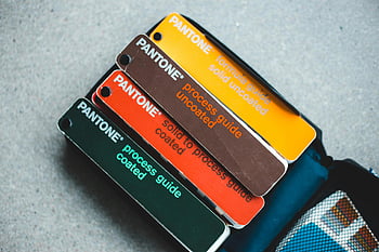 Pantone colors, Pantone color guides, vibrant shades, creative design, Pantone formula guide, Pantone process guide, solid uncoated, process guide uncoated, solid to process guide, process guide coated, top view