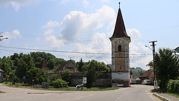 Motis, Biserica evanghelica fortificata, fortified church, late Gothic style, bell tower, 15th century bells, baroque altar, Michael Gross organ, village history, surrounding wall, defense towers