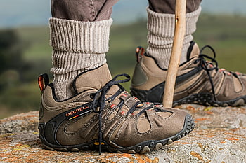 Merrell hiking shoes, brown and gray, outdoor adventure gear, hiking boots, rock edge, Merrell shoes, hiking stick, outdoor shoes, adventure footwear, hiking footwear, Merrell boots