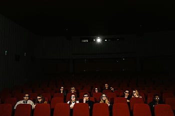 audience, movie theater, 3D movie, wearing glasses, dark theater, cinema, group of people, watching movie, red seats, theater interior, moviegoers