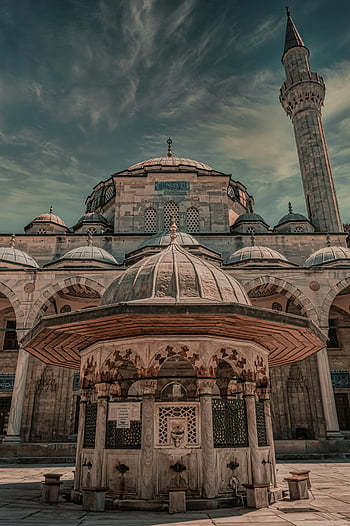 Sokollu Mehmet Pasha Mosque, Istanbul, Turkey, Islamic architecture, historic mosque, minaret, domes, Ottoman architecture, religious building, stone structure, courtyard fountain