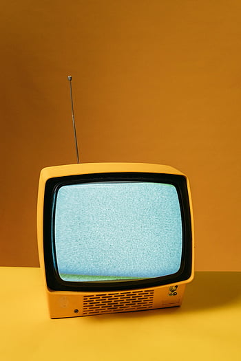 classic yellow TV, blank screen, retro television, orange backdrop, static screen, vintage themes, yellow TV, retro TV, vintage television, static display, orange background
