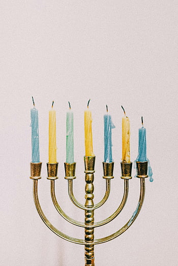 Hanukkah, menorah, colorful candles, yellow candles, blue candles, green candles, Hanukkah traditions, seven candles, beautifully adorned, festive, holiday decor