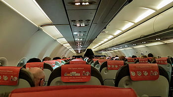 airplane interior, passengers, airplane cabin, seated passengers, flight, airplane seats, cabin view, interior view, airplane travel, club express onboard, flight experience