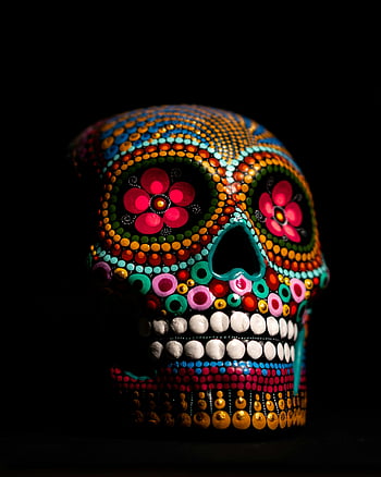 Multicolored Skull Decor, Day of the Dead, sugar skull, vibrant colors, intricate designs, black background, colorful skull, Mexican art, decorative skull, festive skull, skull art
