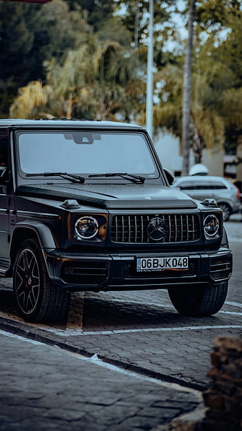 Black Mercedes SUV, Mercedes-Benz SUV, urban area, luxury car, black car, parked car, elegance, luxury vehicle, Mercedes-Benz G-Class, city street, urban parking