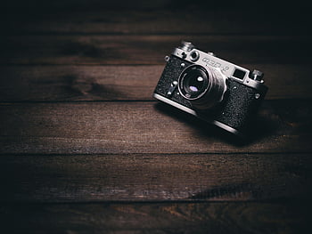 black SLR camera, vintage camera, photography equipment, wooden surface, classic camera, analog camera, camera lens, retro camera, black camera, camera body, photo gear