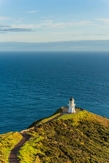 Cape Reinga Lighthouse, zonsondergang, noordelijke gebieden, nieuw Zeeland, oceaan, prachtig uitzicht, kust, vuurtoren, landschap, natuur, reizen