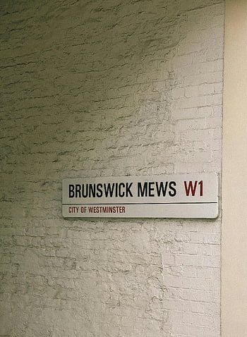 Brunswick Mews, City of Westminster, London, street sign, historic brick wall, location signage, W1, urban signage, wall-mounted sign, city street sign, mews sign