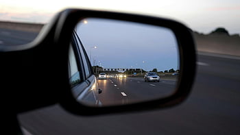 side mirror, highway reflection, twilight scene, car motion, vehicle speed, road view, evening traffic, mirror image, car side mirror, twilight highway, motion capture