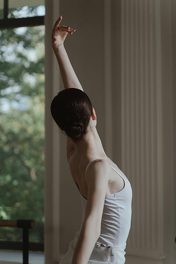 female ballerina, ballet dances, elegant ballerina, graceful posture, dance studio, ballerina performance, ballet dancer, dance pose, studio dance, ballerina in studio, ballet artistry