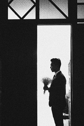 groom, bouquet, doorway, silhouette, love, anticipation, wedding, black and white, bridegroom, waiting, bride