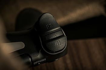 Playstation-Controller, R1-Auslöser, R2-Auslöser, Gaming-Controller, Nahansicht, detailliert, Tasten, Schaltfläche „Optionen“, Spielzubehör, Controller-Trigger, Videospiel-Controller