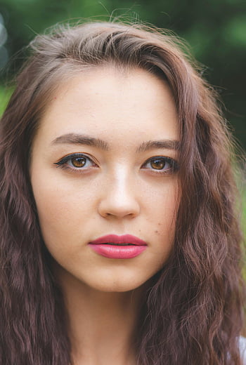 shallow focus photography, woman, natural makeup, loose waves, outdoor setting, close-up, portrait, beauty, female, hair, lips