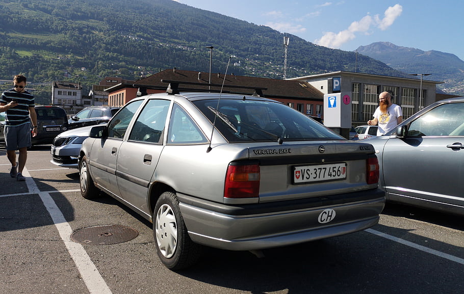Opel, Vectra, car, parking, lot, mountains, background, man, walking, license, plate