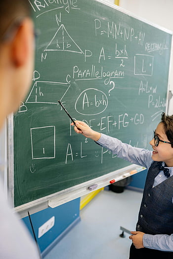 boy, discussing, answer, mathematical formulas, chalkboard, class, geometry concepts, confident presentation, parallelogram, triangle, rectangle