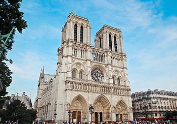 Notre Dame Cathedral, Paris, France, architectural beauty, crowds, Gothic architecture, historical landmark, famous building, tourist attraction, European landmark, white concrete building