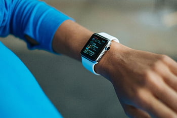 smartwatch, white silicone strap, digital display, adult wrist, wearable technology, fitness tracker, health monitor, smart device, wristwatch, tech accessory, activity tracker
