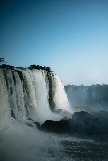 Iguazu Falls, Foz do Iguaçu, Brazil, scenic waterfall, blue sky, clear day, cascading water, natural wonder, South America, travel destination, stunning view