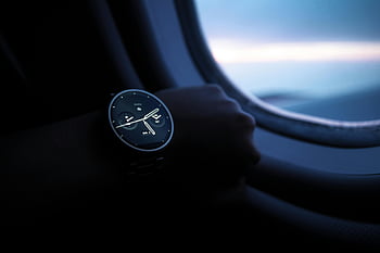 analog watch, smartwatch, wrist, airplane window, flight, travel, timepiece, luxury watch, modern watch, wristwatch, aviation