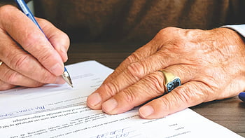 senior adult, signing document, legal document, close-up, hand, gold ring, elderly person, document signing, senior citizen, paperwork, signature