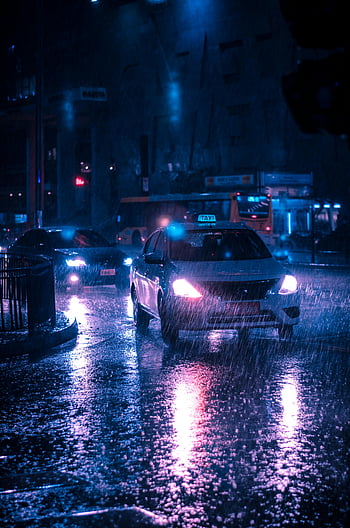 รถแท็กซี่, ถนนในเมือง, กลางคืน, ฝนตกหนัก, แสงนีออน, cityscape, ถนนเปียก, สะท้อน, ไฟรถยนต์, การขนส่งสาธารณะ, ฉากกลางคืน