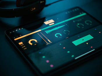 tablet, music editor app, digital audio mixing, software, modern technology, portability, headphones, audio editing, music production, portable device, touchscreen interface