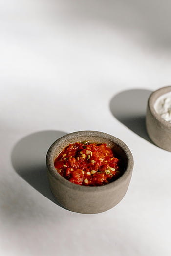 Chili dip, mini bowl, spicy red chili, stone bowl, white table, food enthusiasts, close-up, spices, dip, bowl, table