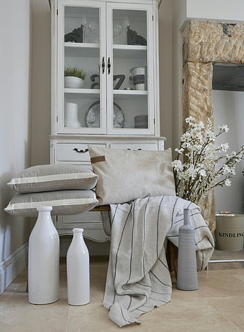 elegant interior, classic furniture, decorative vases, stylish vintage, living room setup, white cabinet, floral decor, cushions, vintage decor, interior design, home decor