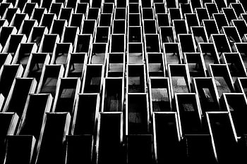 black and white photo, abstract geometric design, architectural design, futuristic elements, modern elements, black and white architecture, geometric architecture, abstract architecture, modern architecture, futuristic architecture, black and white building