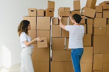 young couple, moving boxes, new home, unpacking, organizing, relocation, collaboration, cardboard boxes, moving day, home setup, young adults
