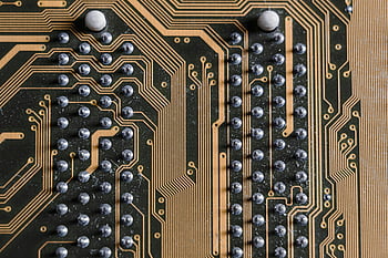 printed circuit board, close-up photo, intricate lines, solder points, detailed view, electronic components, circuitry, PCB, microelectronics, technology, hardware