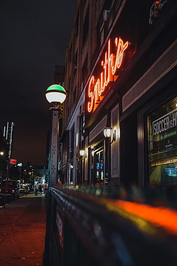 gray lamp post, neon signs, urban night scene, bustling city, street view, dimly lit atmosphere, Smith's restaurant, neon lighting, city nightlife, urban nightlife, street lamp