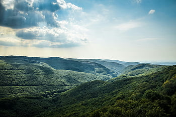 Bükk Mountains, lush forests, vibrant sky, Miskolc, Hungary, green tree, coated mountain, white clouds, blue sky, daytime landscape, breathtaking view
