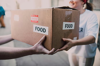 charity, food donation, hands exchanging, brown box, food box, charity support, volunteer work, food assistance, community support, food distribution, donation box