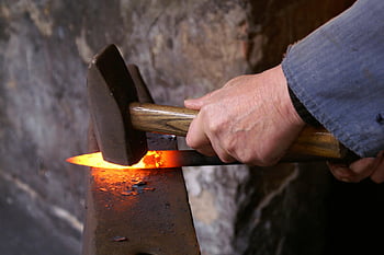 blacksmith, forging metal, hammer, anvil, glowing metal, forge, shaping metal, blacksmithing, metalworking, craft, traditional craft