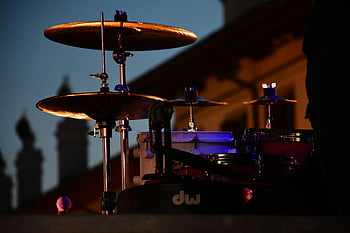 drum cymbals, drum kit, stage setup, twilight, cymbals, hardware, drum set, musical instruments, stage lighting, dw drums, outdoor stage