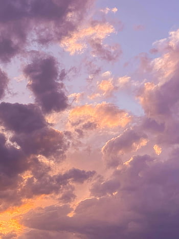 sunset sky, colorful clouds, peaceful evening, vibrant sky, fluffy clouds, tranquil scene, evening clouds, sunset clouds, bright sky, colorful sunset, peaceful sky