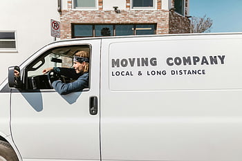 moving company, local services, long-distance services, driver, van, close-up shot, man, riding, car, transportation, delivery