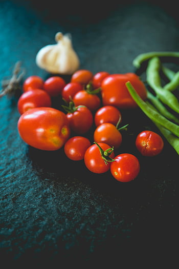 red tomatoes, black textile, vibrant tomatoes, green beans, garlic, fresh food, healthy food, food composition, vegetables, close-up, still life
