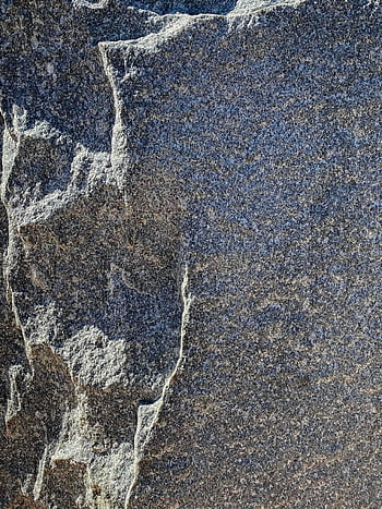 uneven surface, stone texture, weathered granite, rock cracks, natural patterns, detailed texture, granite rock, stone background, rock surface, natural stone, weathered stone