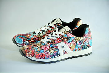 multicolored sneakers, low-top sneakers, vibrant patterns, casual wear, colorful sneakers, eye-catching sneakers, multicolored shoes, low-top shoes, casual shoes, vibrant shoes, colorful shoes