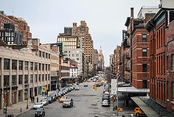 Brown Concrete Building, New York City, urban architecture, bustling traffic, daytime street, cityscape, urban scene, city life, busy street, urban environment, city buildings