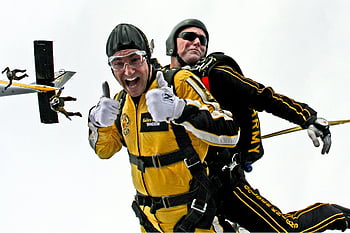 parachuter, yellow suit, thumbs up, skydiving, tandem jump, parachute, skydiver, extreme sport, aerial view, adventure, excitement